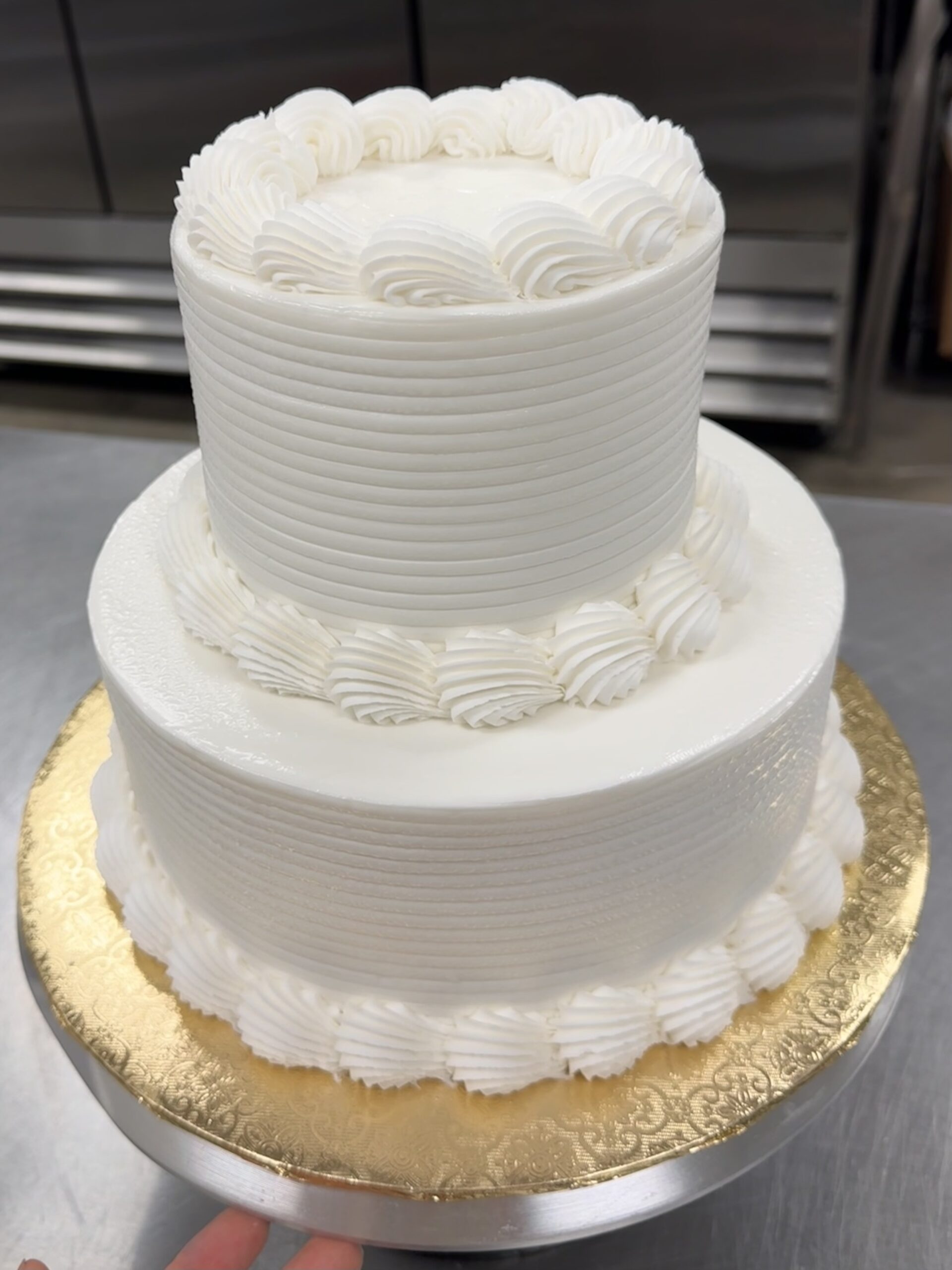 Two tier cake white shell
